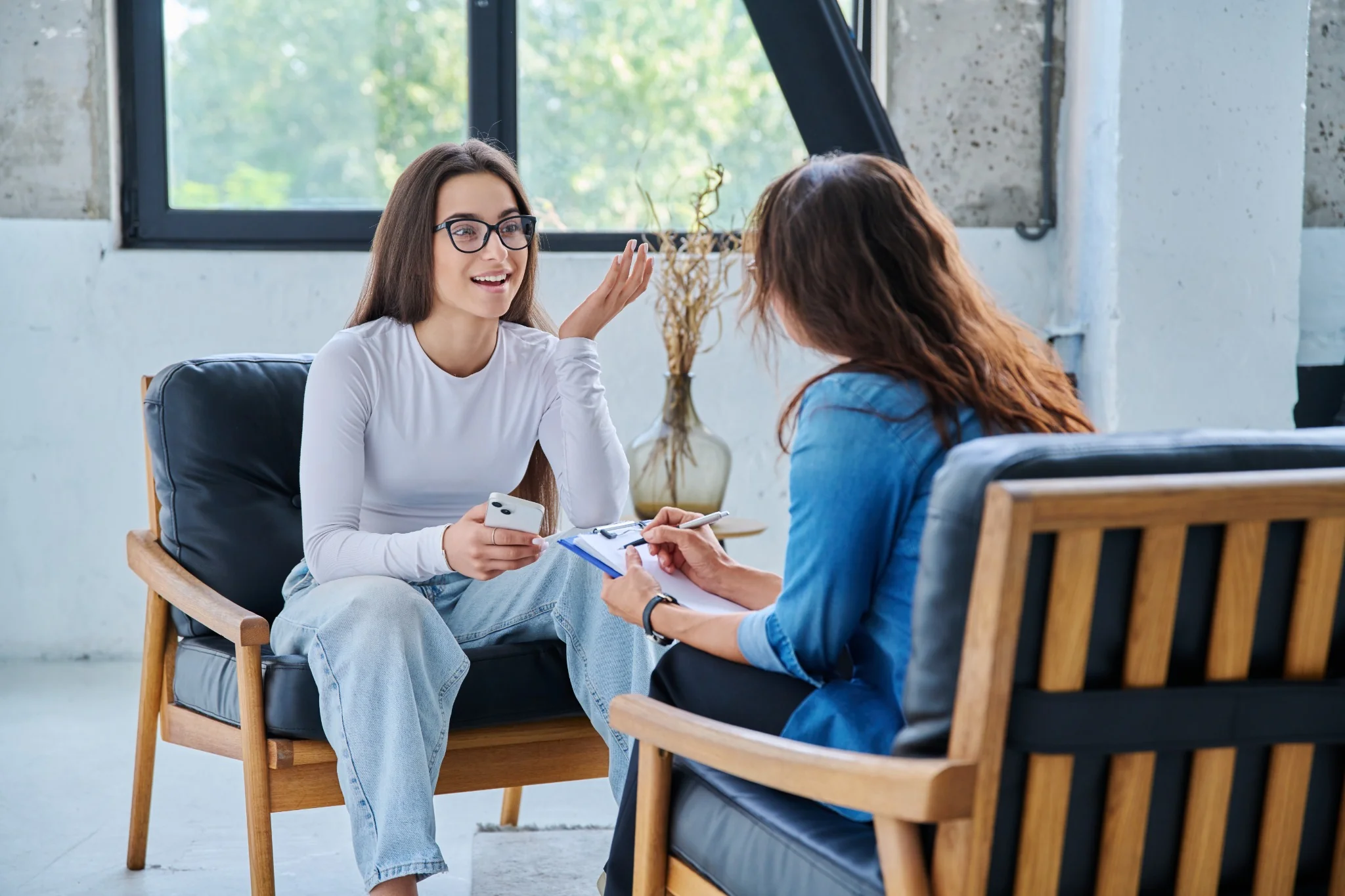 two women discussing treatment options for depression